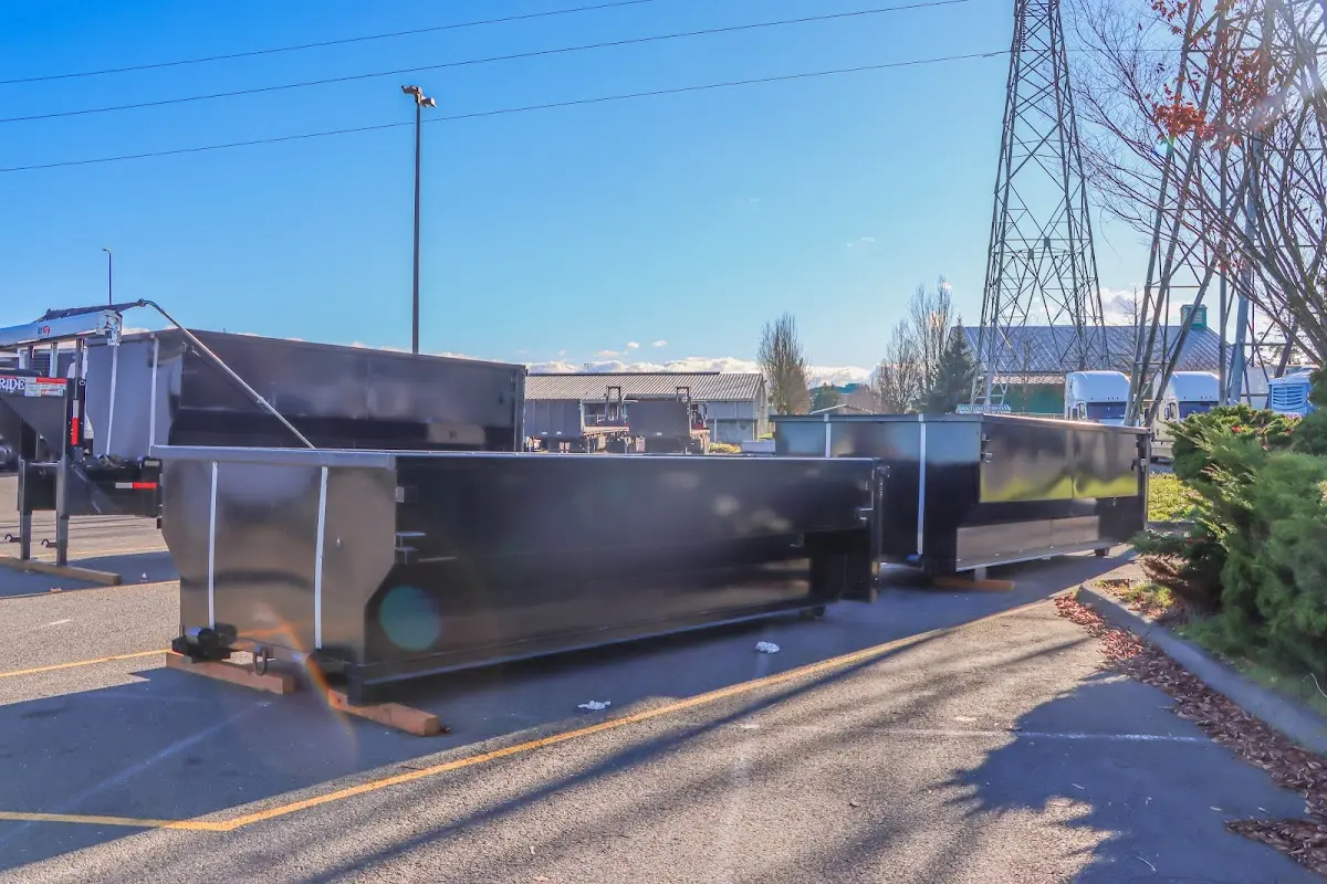 Roll-off dumpster ready for waste disposal at job site for Construction Dumpster Rental in Bangor